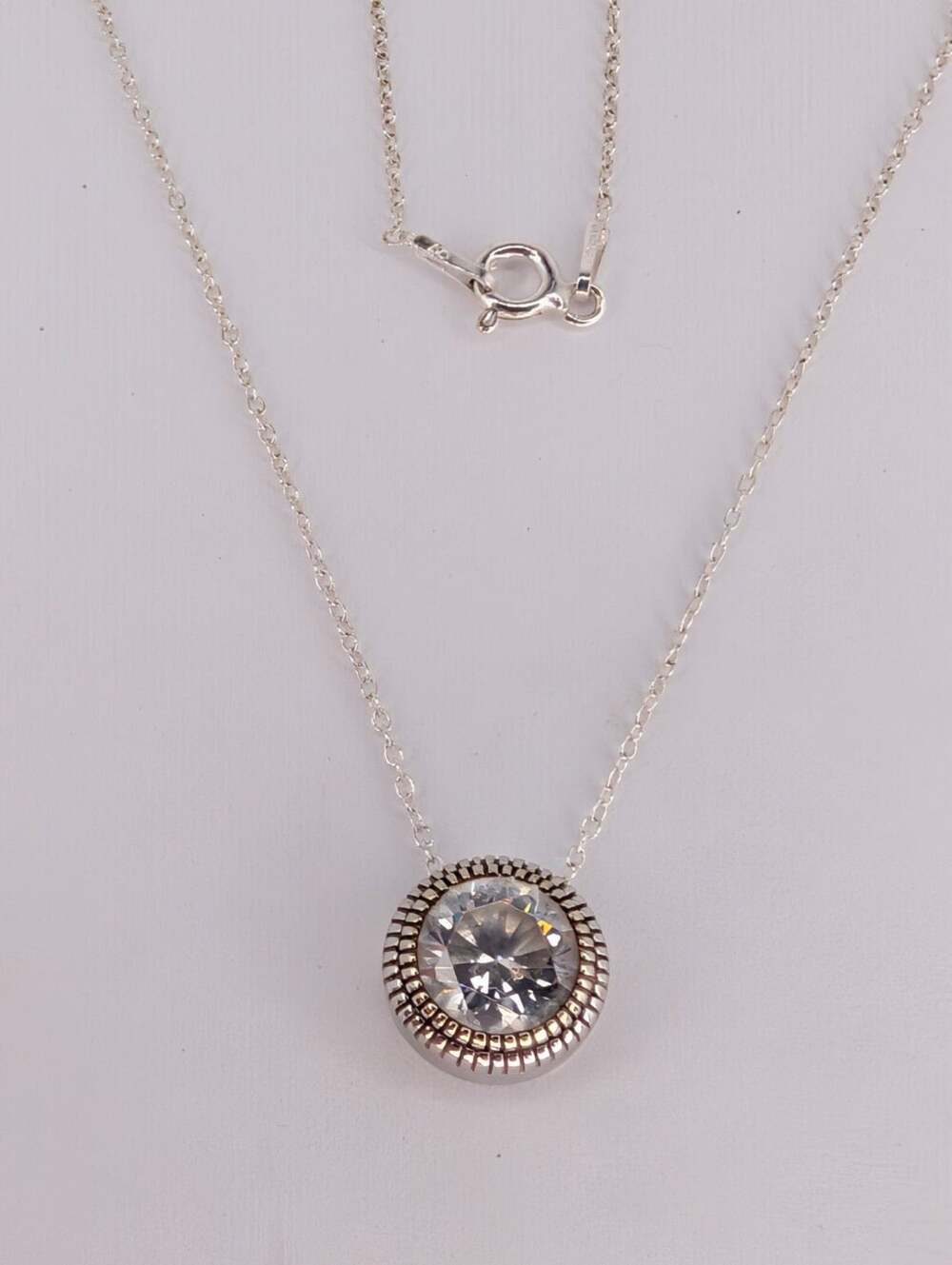 Sterling Silver Bezel Set Solitaire Pendant And Necklace